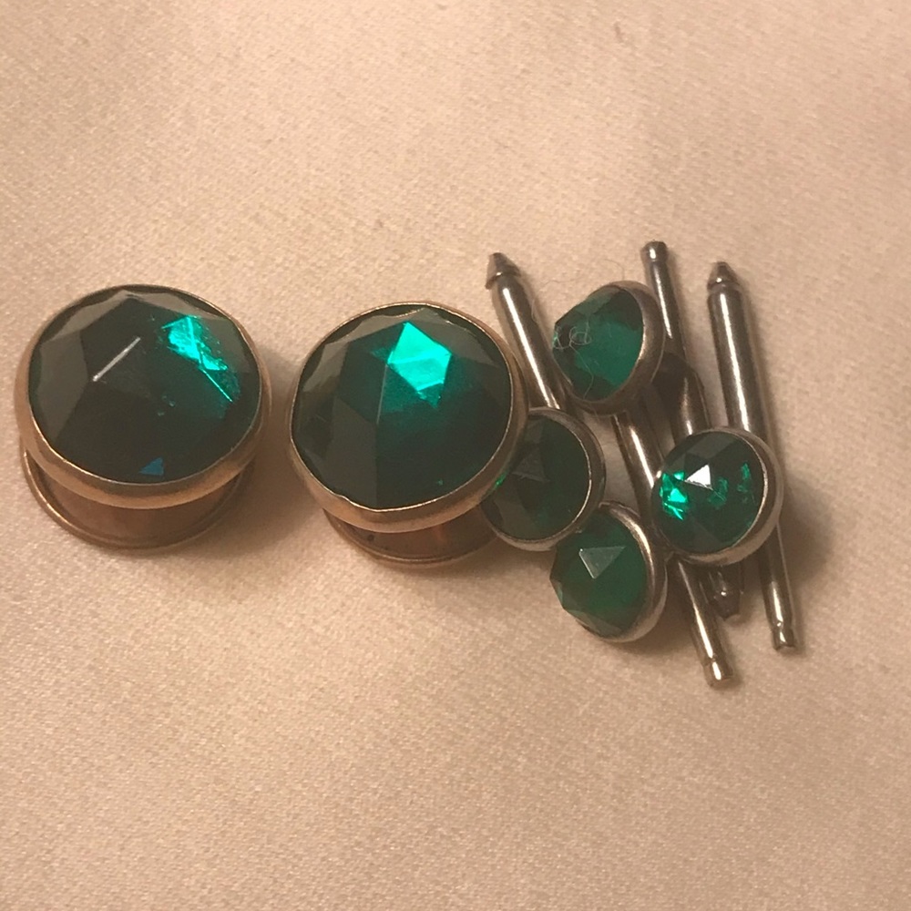 Vintage cufflinks and shirt buttons.
